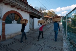 Carrying supplies up Janitzio